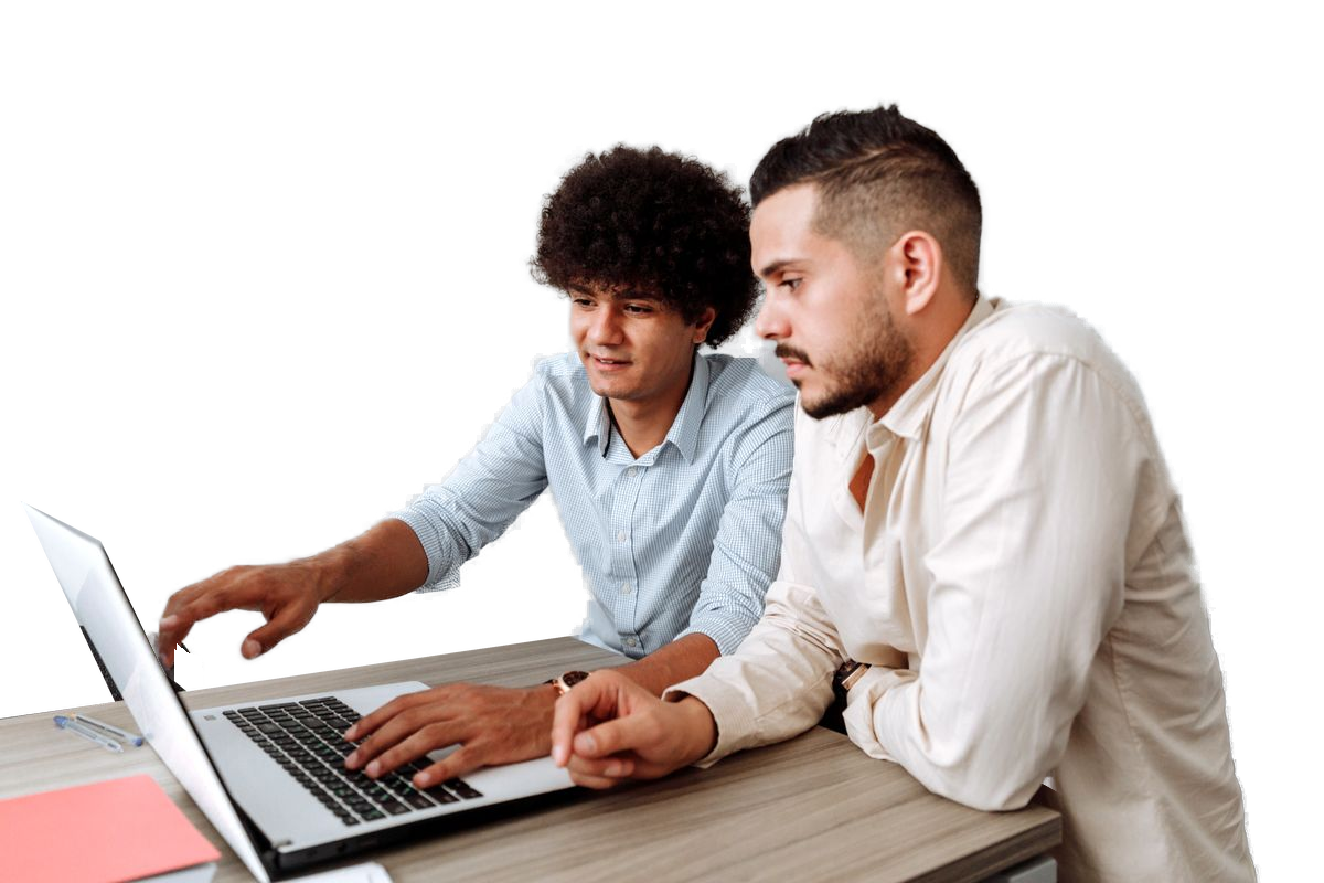 Two male colleagues working together on a laptop in an office